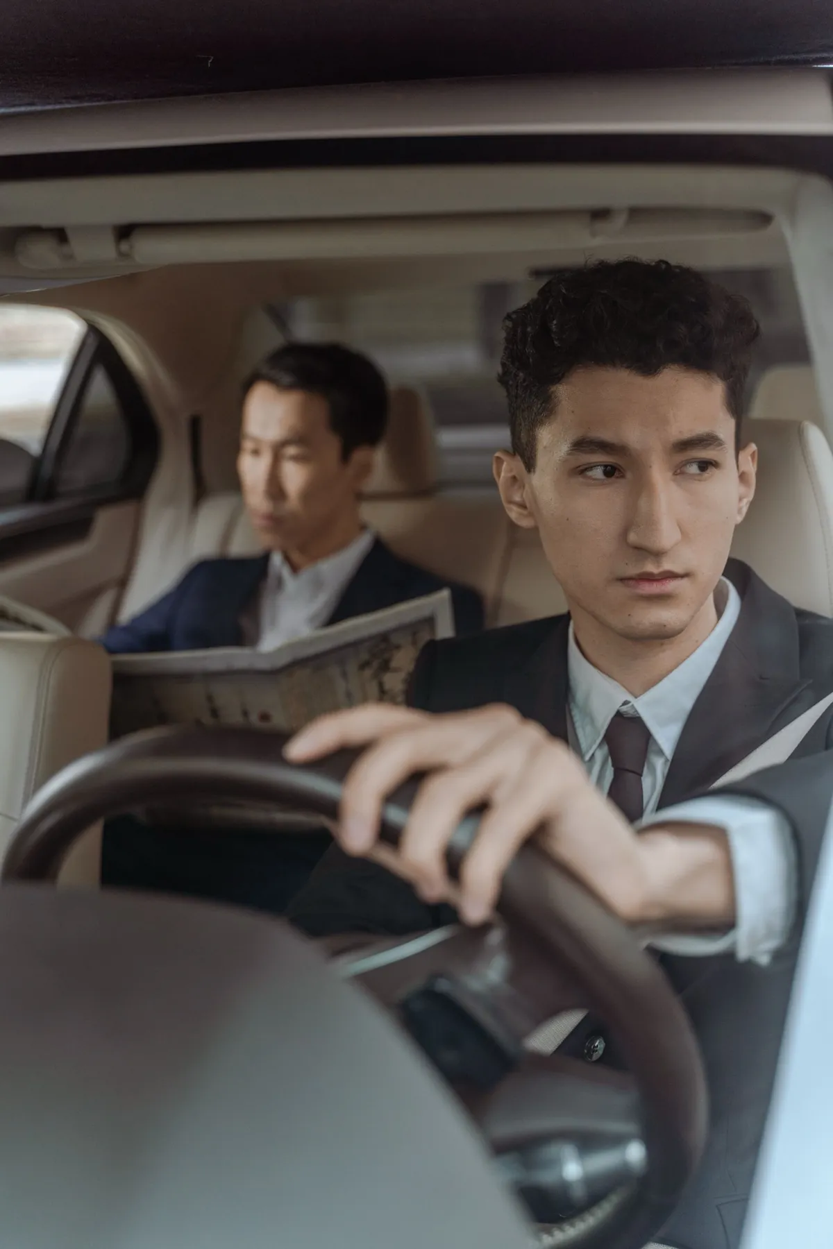 Passenger relaxing while the chauffeur waits