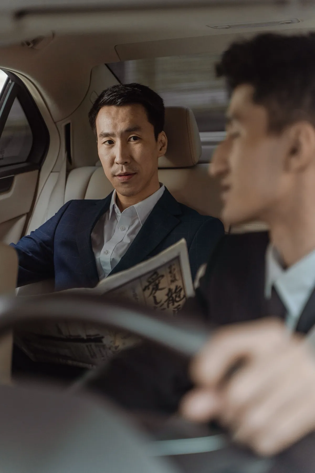 Passenger riding in a chauffeured SUV